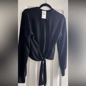 Sparkling black top with back cut out. From Von Maur new with tags.
